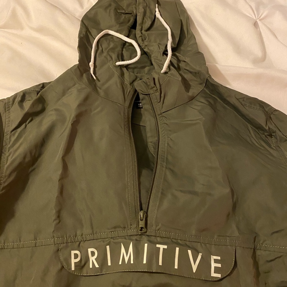 Green primitive windbreaker